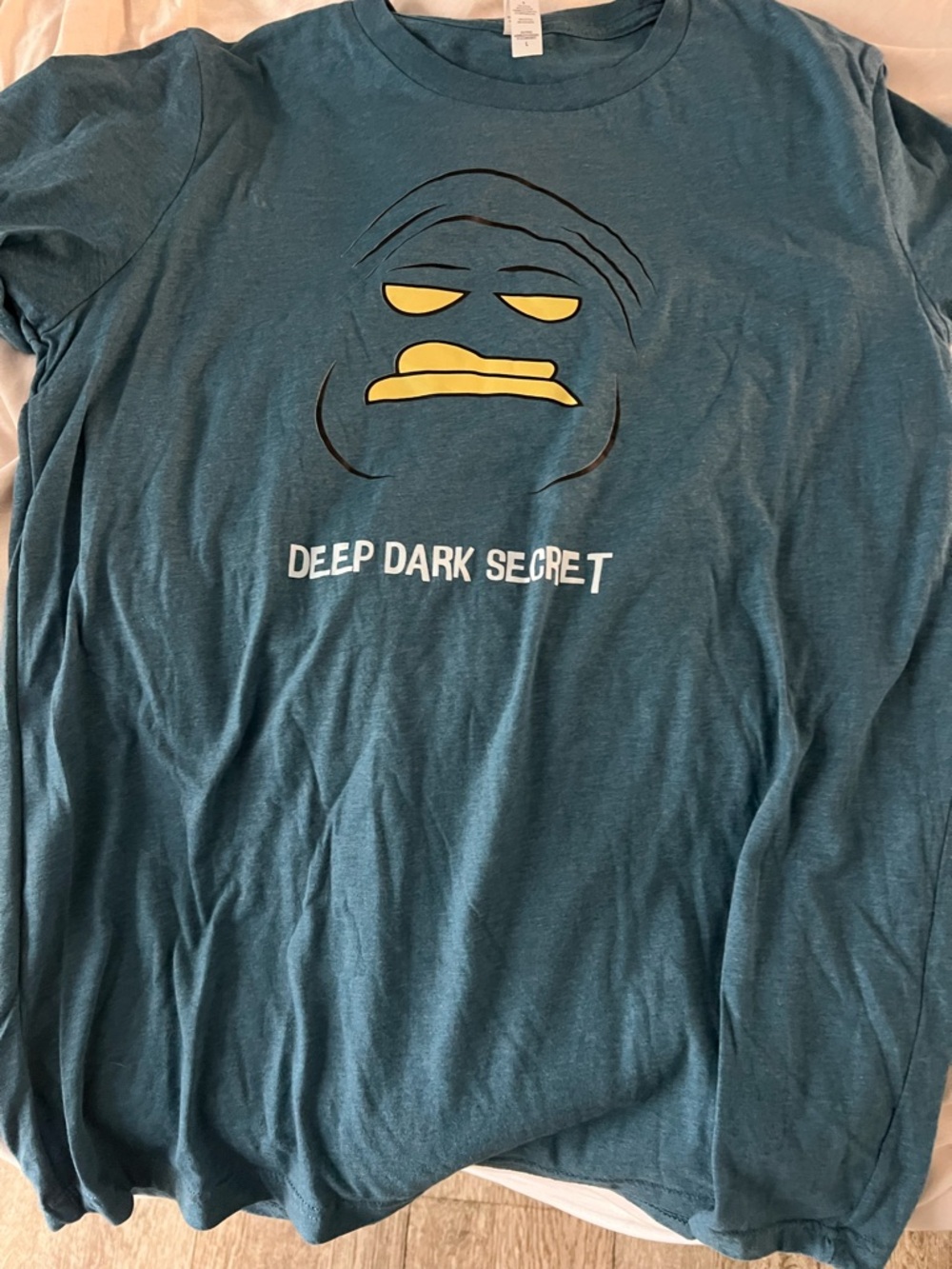Bella Canvas Teal Graphic Tee with Yellow Face Accents